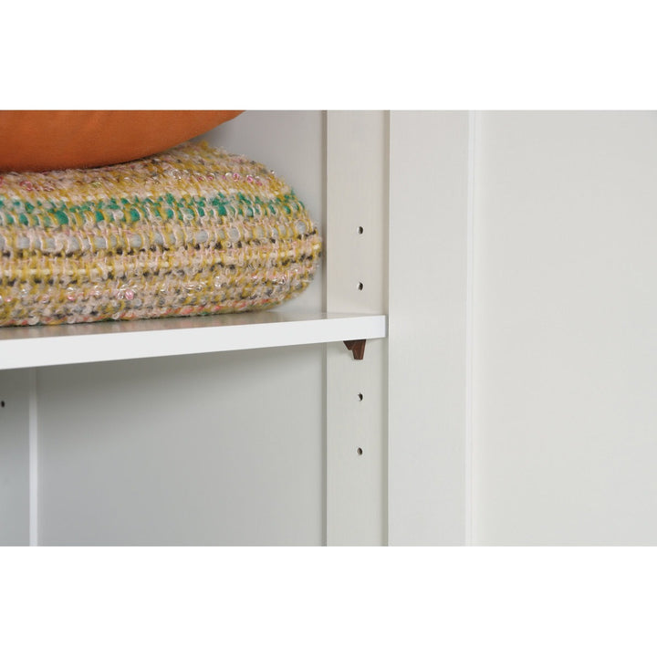 Bunk bed with a mattress and pillow on a white background