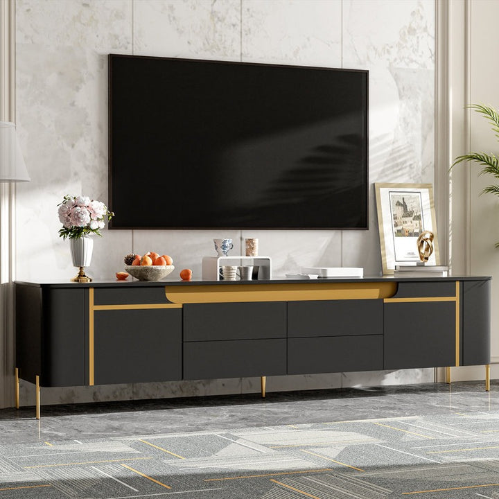 black tv unit with gold finished
