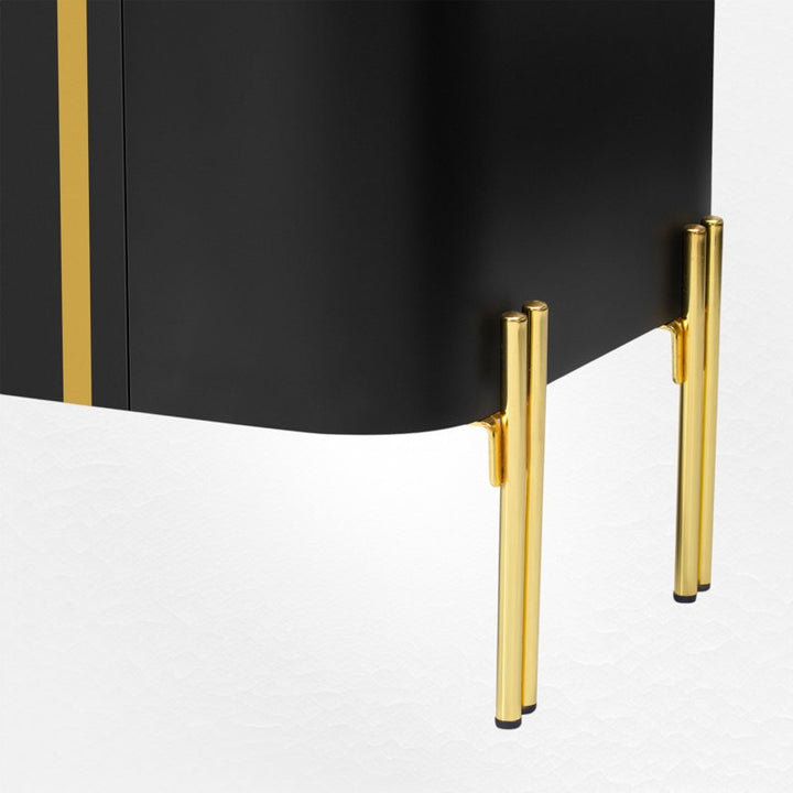 golden legs of black tv unit
