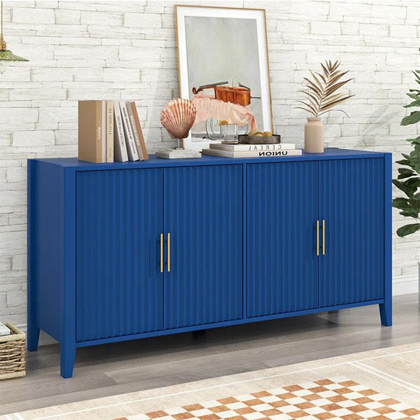 A small blue sideboard and cabinet with gold handles and a brushed finish, placed against a wall with decorative items on top.