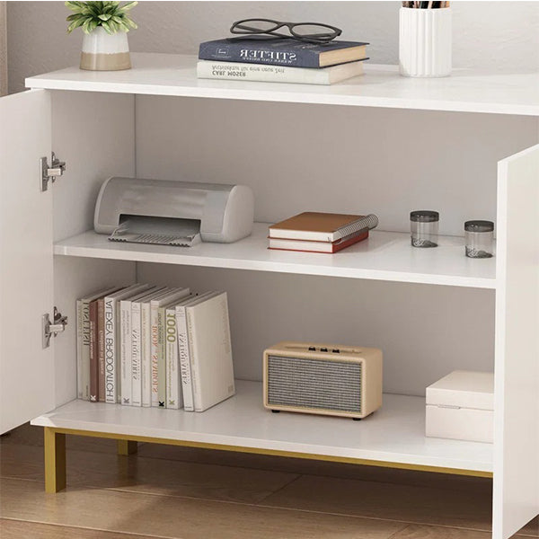 Interior of white Brians sideboard with open doors revealing two shelves in each cabinet for organized storage