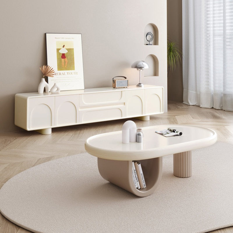 White modern PU-painted tv unit in a living room with center table