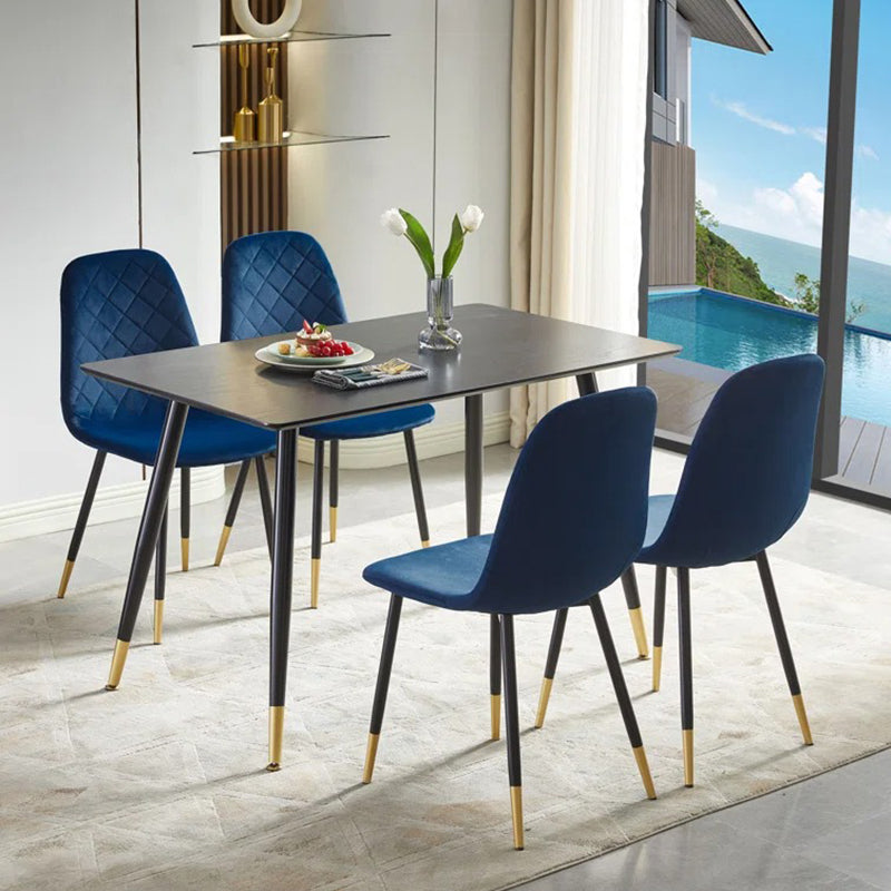 Martin 4-seater blue dining table set with metal legs and fabric chairs.
