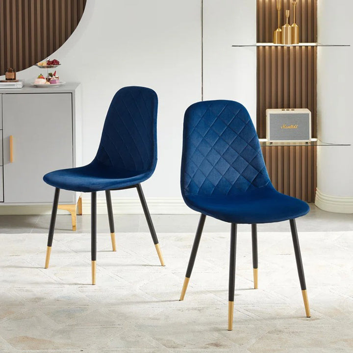 Stylish blue dining chair with black and gold accent legs