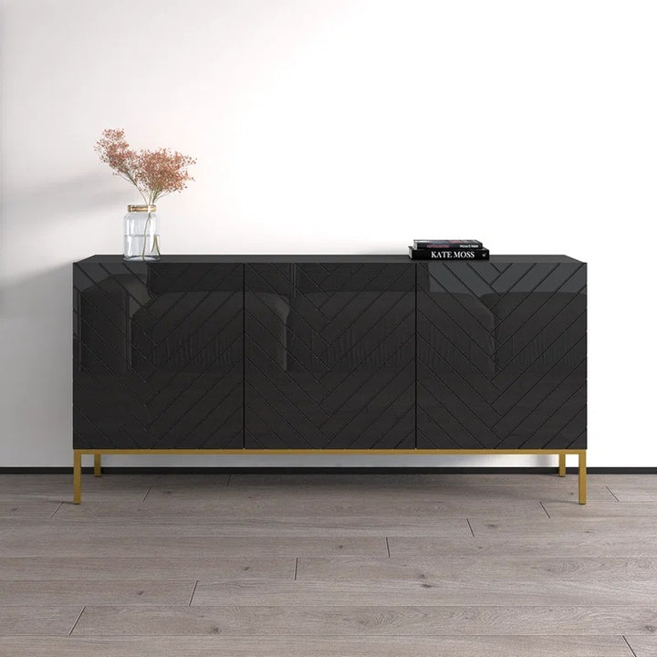 sleek black storage unit with golden legs and modern geometric pattern design