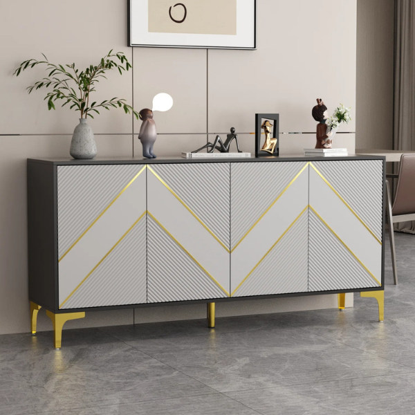 A modern black and grey sideboard with geometric patterns and gold accents, featuring metal legs and operable shutters, placed in a modern interior setting with decorative items on top.