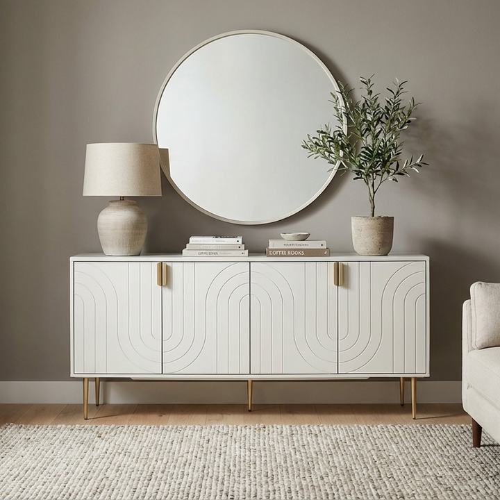 White sideboard with decorative elements in a room setting