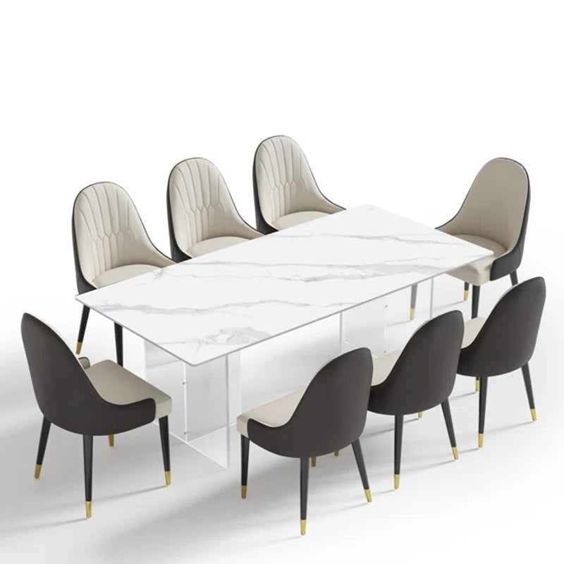 Luxury marble-top 8-seater dining table with premium cushioned chairs on a white background