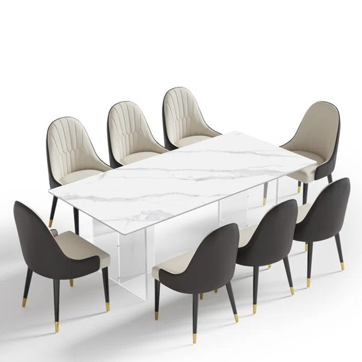 Luxury marble-top 8-seater dining table with premium cushioned chairs on a white background