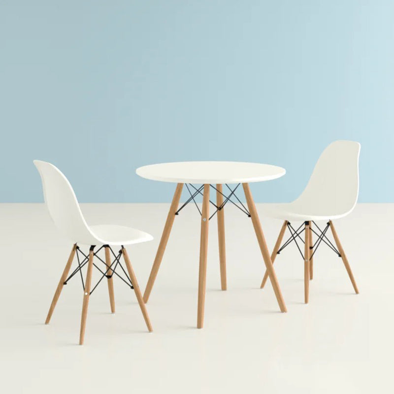 Round dining table with two chairs and a space-saving design for the kitchen.