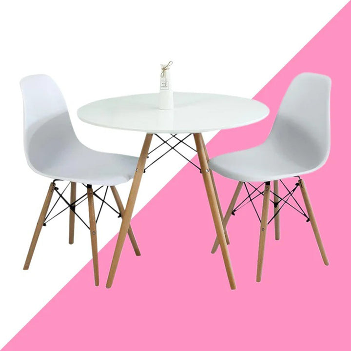 Space-saving round dining table set with 2 chairs in a white and brown finish.