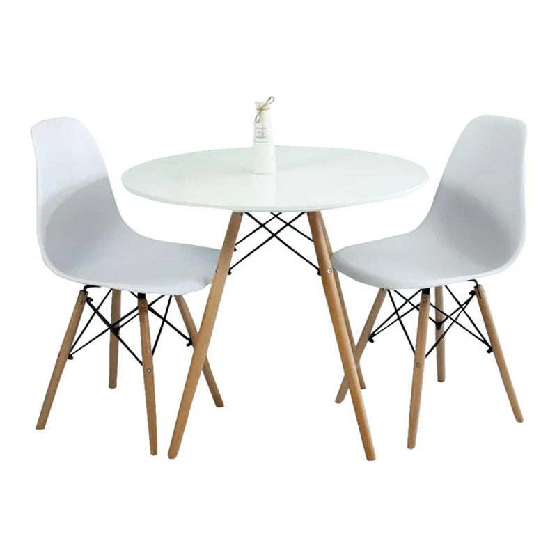 Modern round dining table with two chairs and a space-saving design for the kitchen.