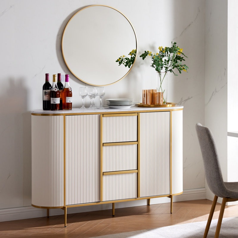 A white elegant sideboard with golden legs