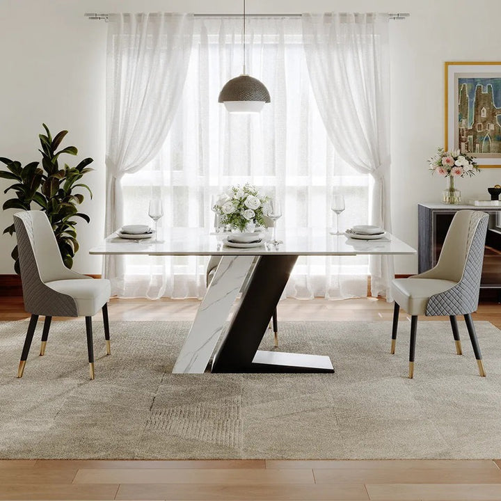 Modern dining room with a stylish dining table and chairs.