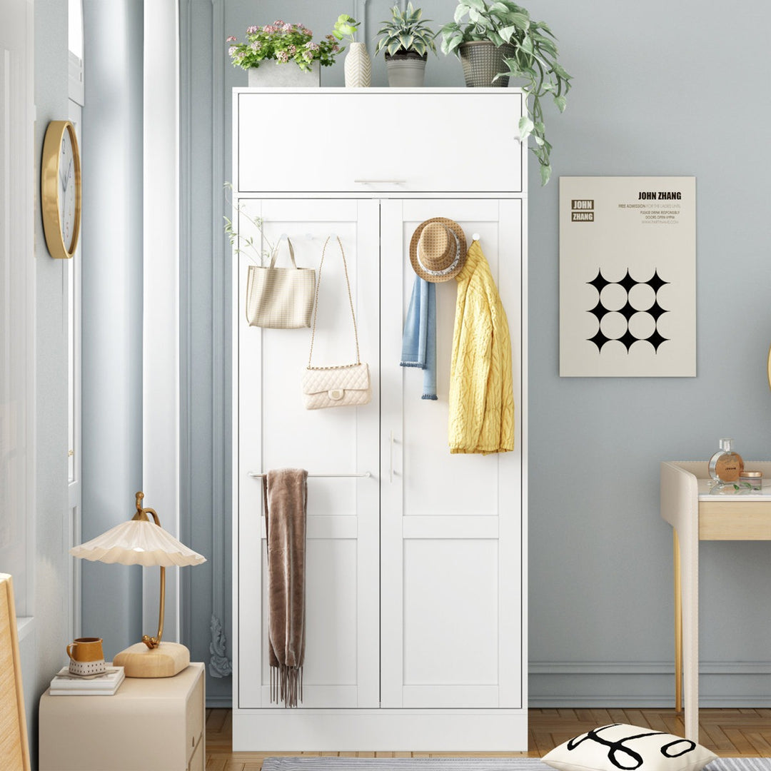 premium white 2-door wardrobe in a small room 