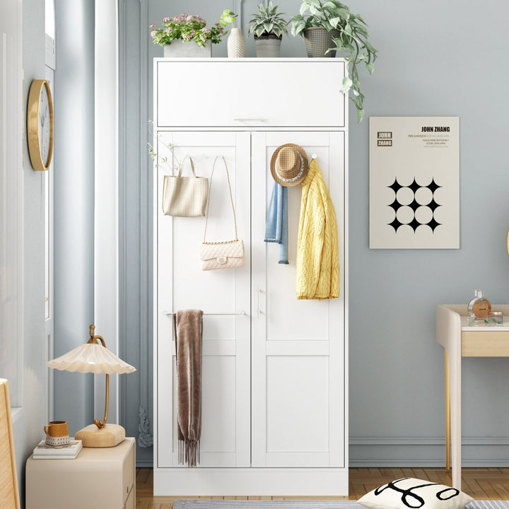 premium white 2-door wardrobe in a small room 