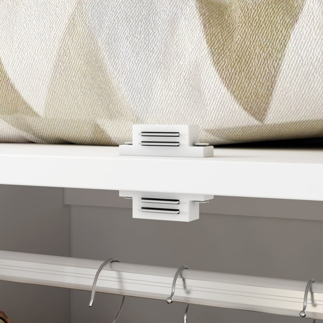 Roller blind with white bracket system on a wardrobe