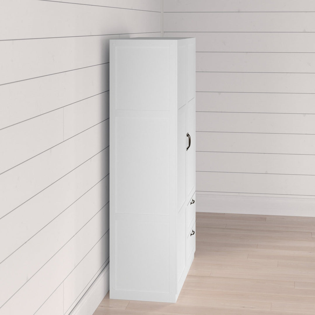 White 2-door wardrobe against a light wood paneled wall