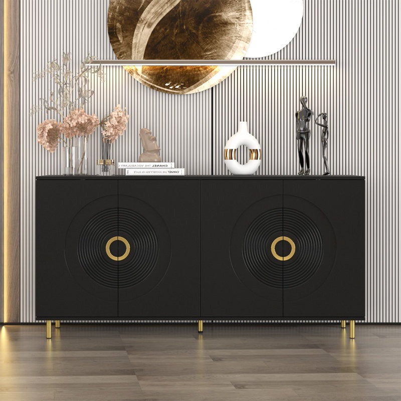 A large black sideboard with gold-tone accents, featuring handwoven cane shutters with grooved circular detailing, and elevated on gold metal legs. The sideboard is displayed in a stylishly decorated room with various decorative items on top.