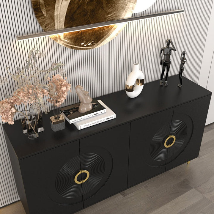 Black elegant console with decorative pieces on top
