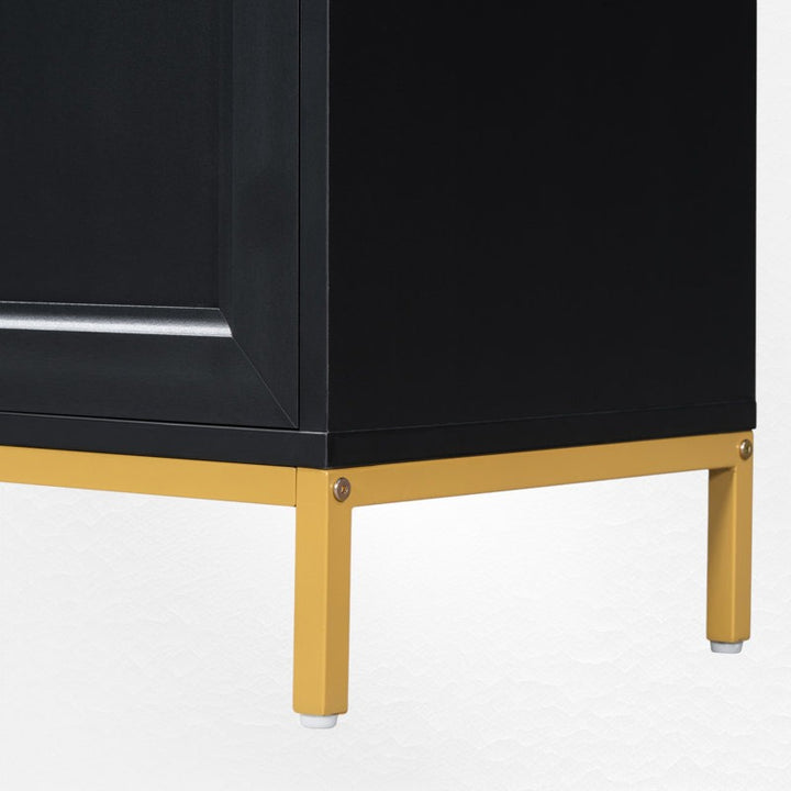 Stylish black cabinet with gold metal base