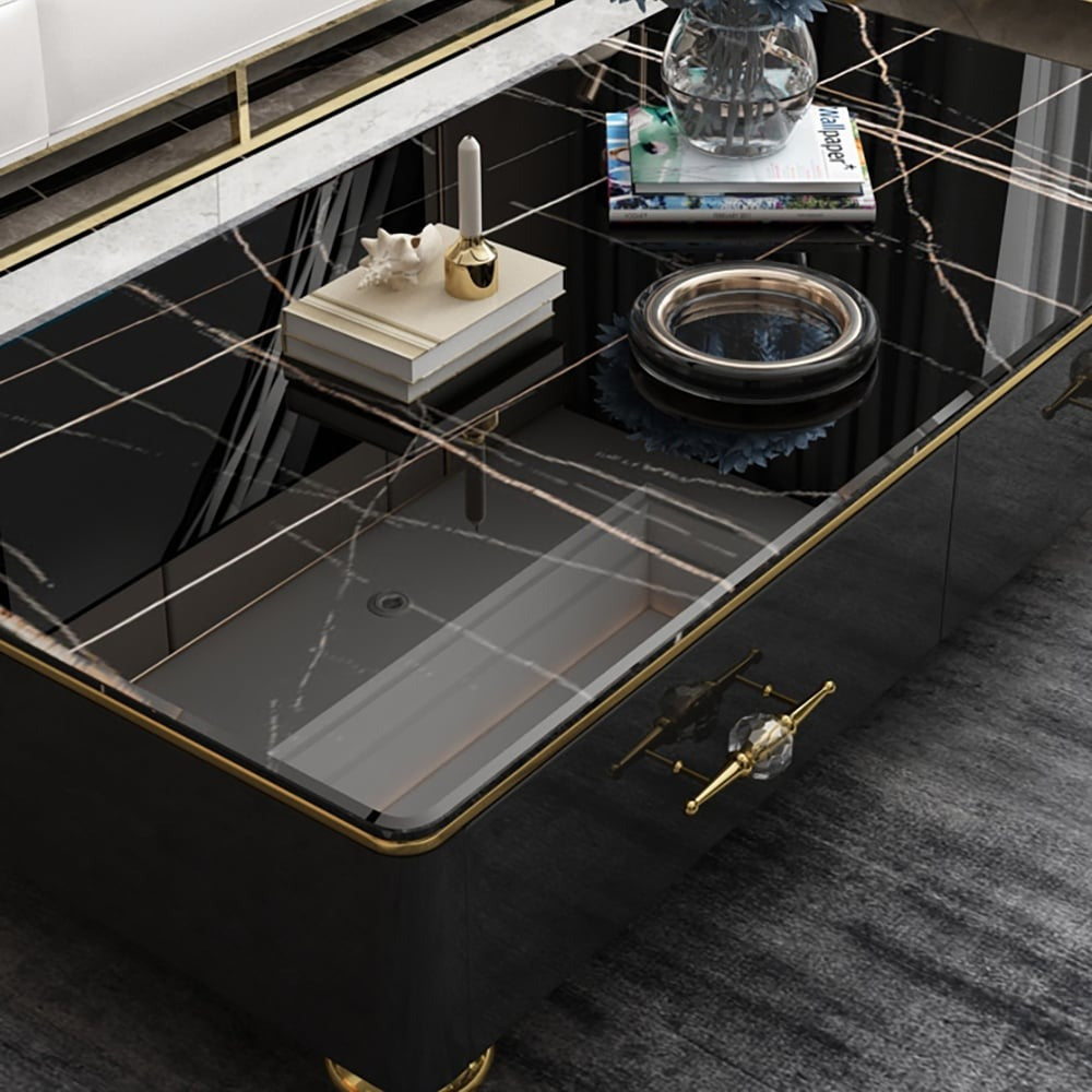 Luxury black coffee table with books and accessories on marble top