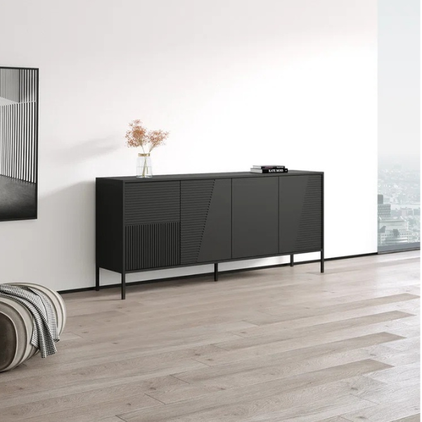 A modern black sideboard placed against a white wall