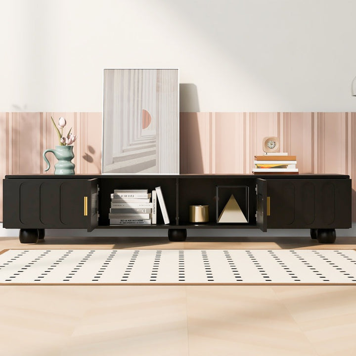 black tv stand with open doors to show internal space