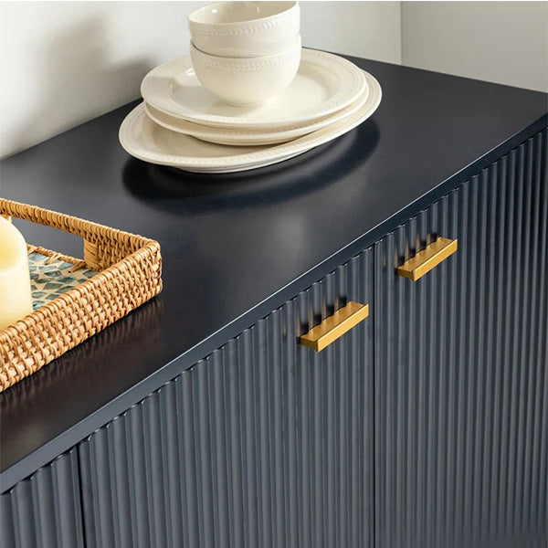 Sleek metal handrail of navy blue sideboard for easy access 