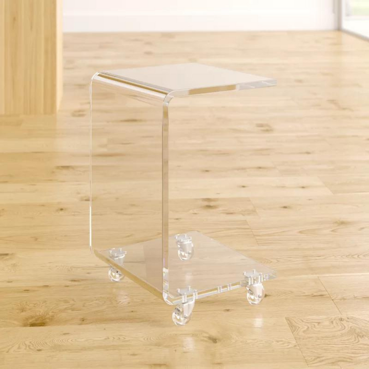side view of Chic Acrylic End Table in clear with C-shaped design