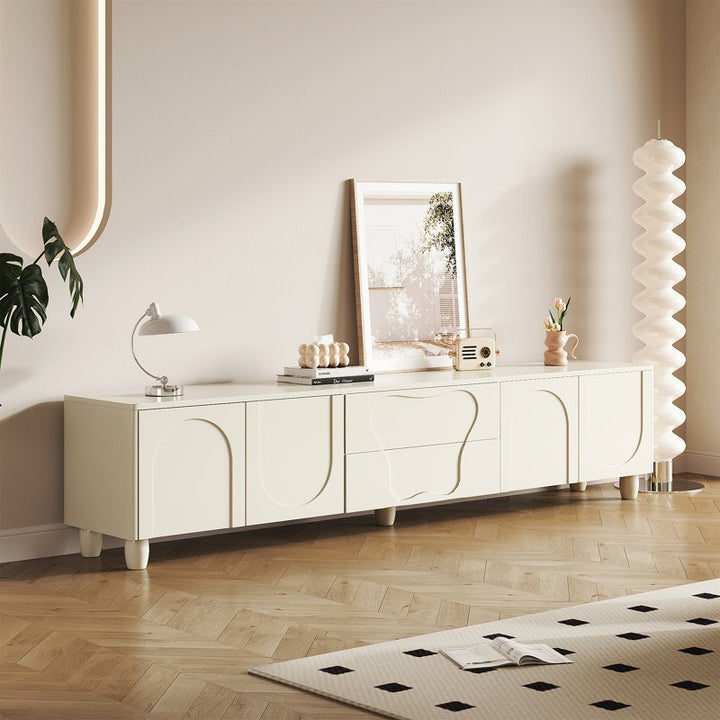 white PU-painted tv unit with a stunning carved design