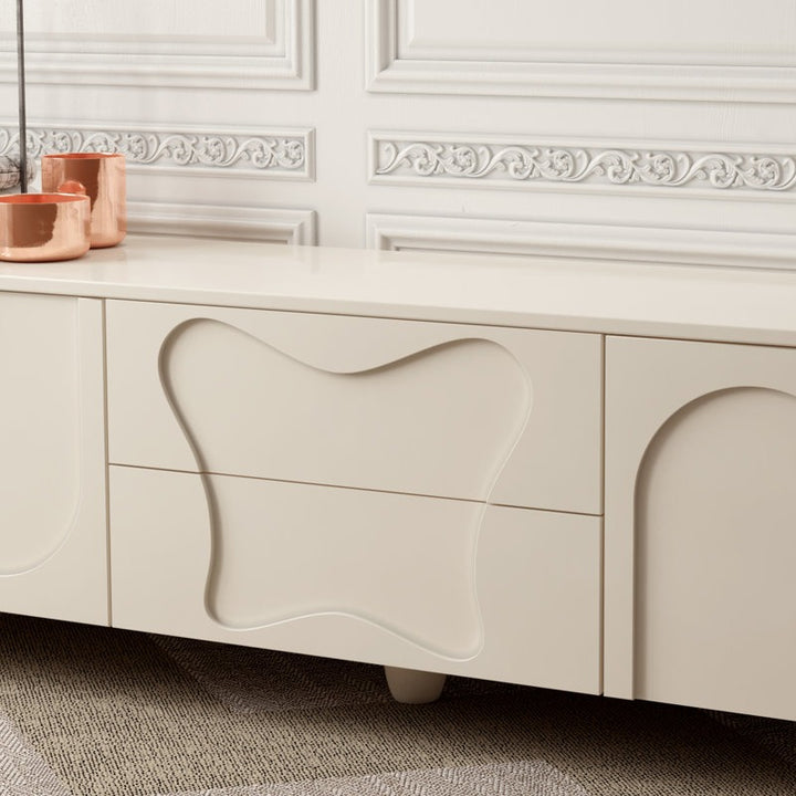 fluid sculpted pattern of white modern tv unit