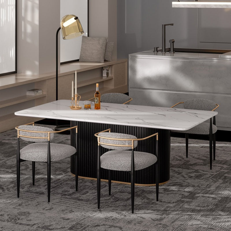 Stylish 4-seater dining table with distinct fluted base and golden accent 
