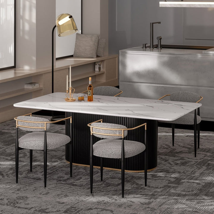 Stylish 4-seater dining table with distinct fluted base and golden accent 