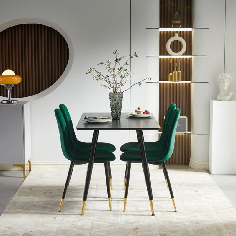 Modern dining table with green ergonomic chairs crafted from high quality fabric