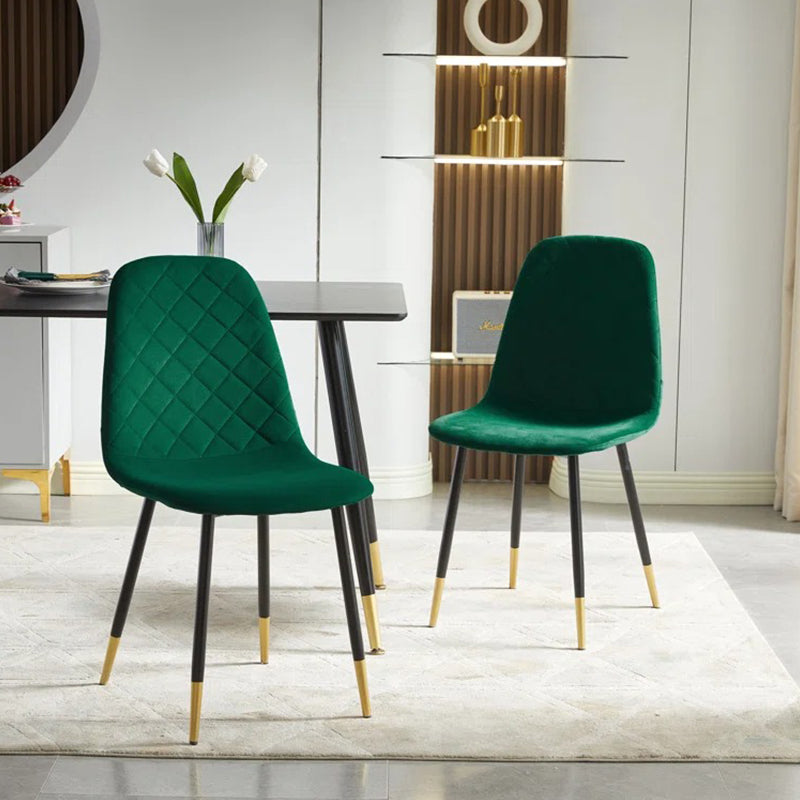 Green dining chair with modern ergonomic curved design with black legs