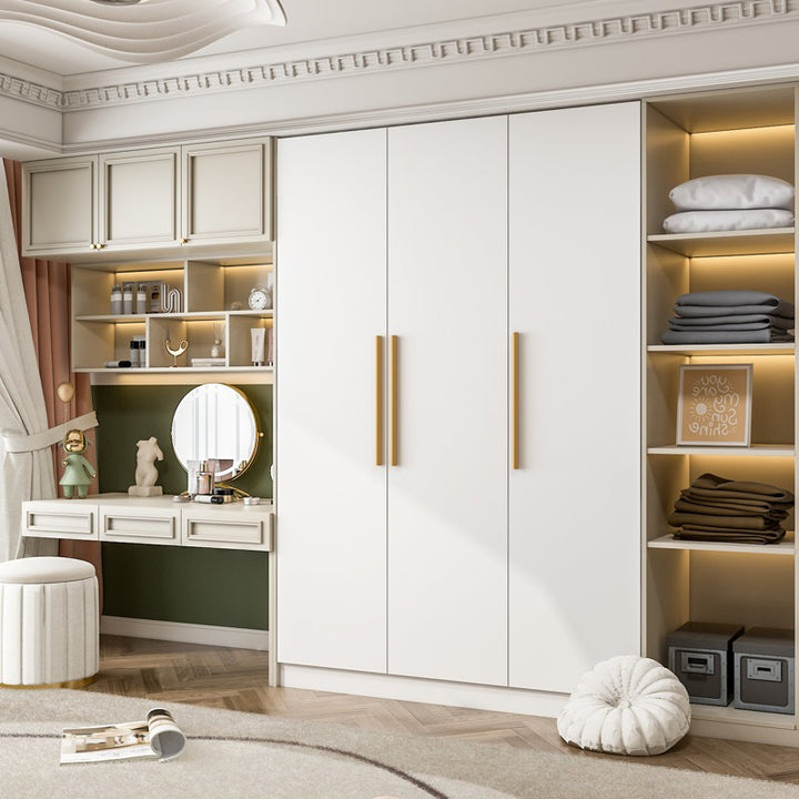 A modern matte white 3-door wardrobe with wooden handles, fitted with multiple storage compartments and an oval hanging rod inside.