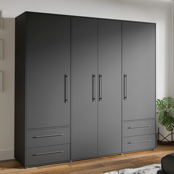 A black matte finish 4 door wardrobe with 4 drawers and 4 shutters, made from pre-laminated MDF board, with visible steel handles and an oval hanging rod inside.