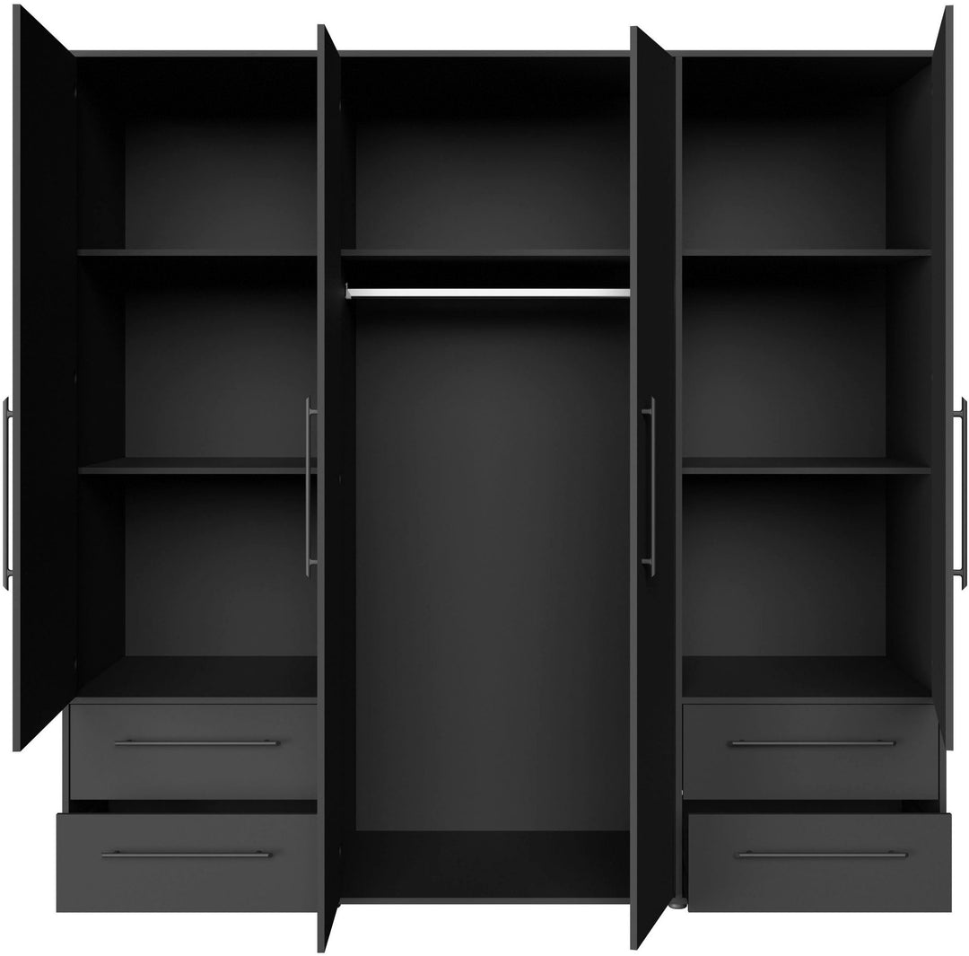 Sleek black modular wardrobe with open drawers and doors to show internal storage