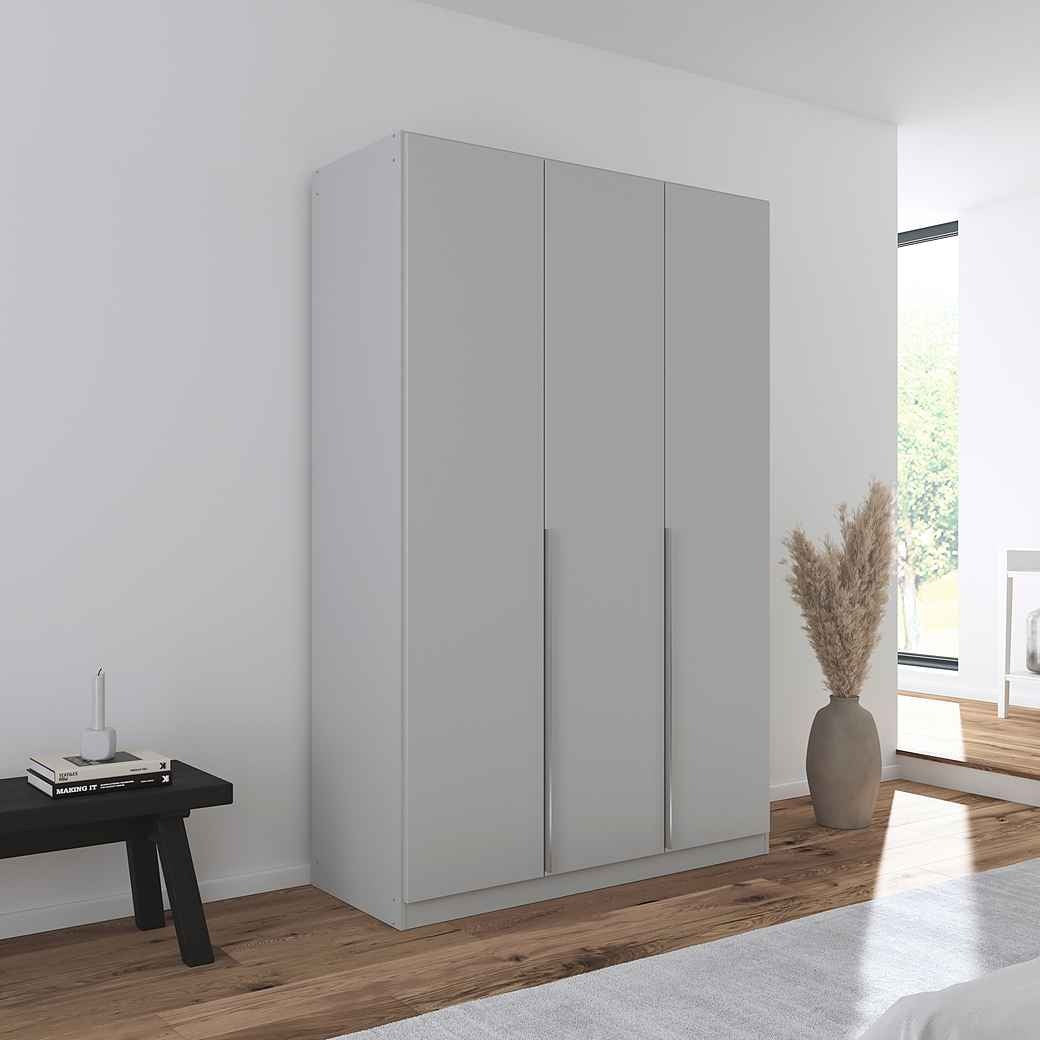 A sleek grey 3-door wardrobe with handle-less design, featured in a modern room setting with minimalistic decor.