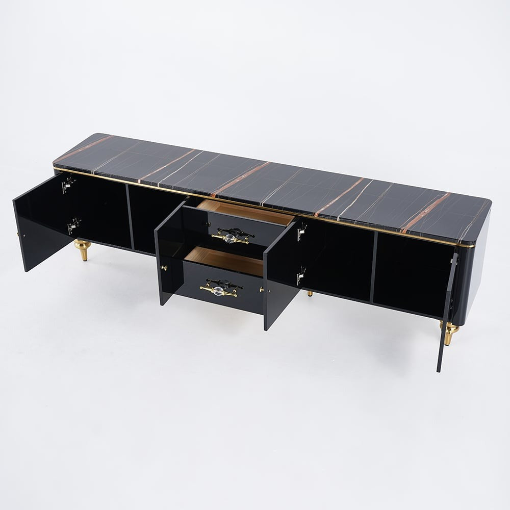 The designer black tv unit with marble top and gold accents offers ample storage space