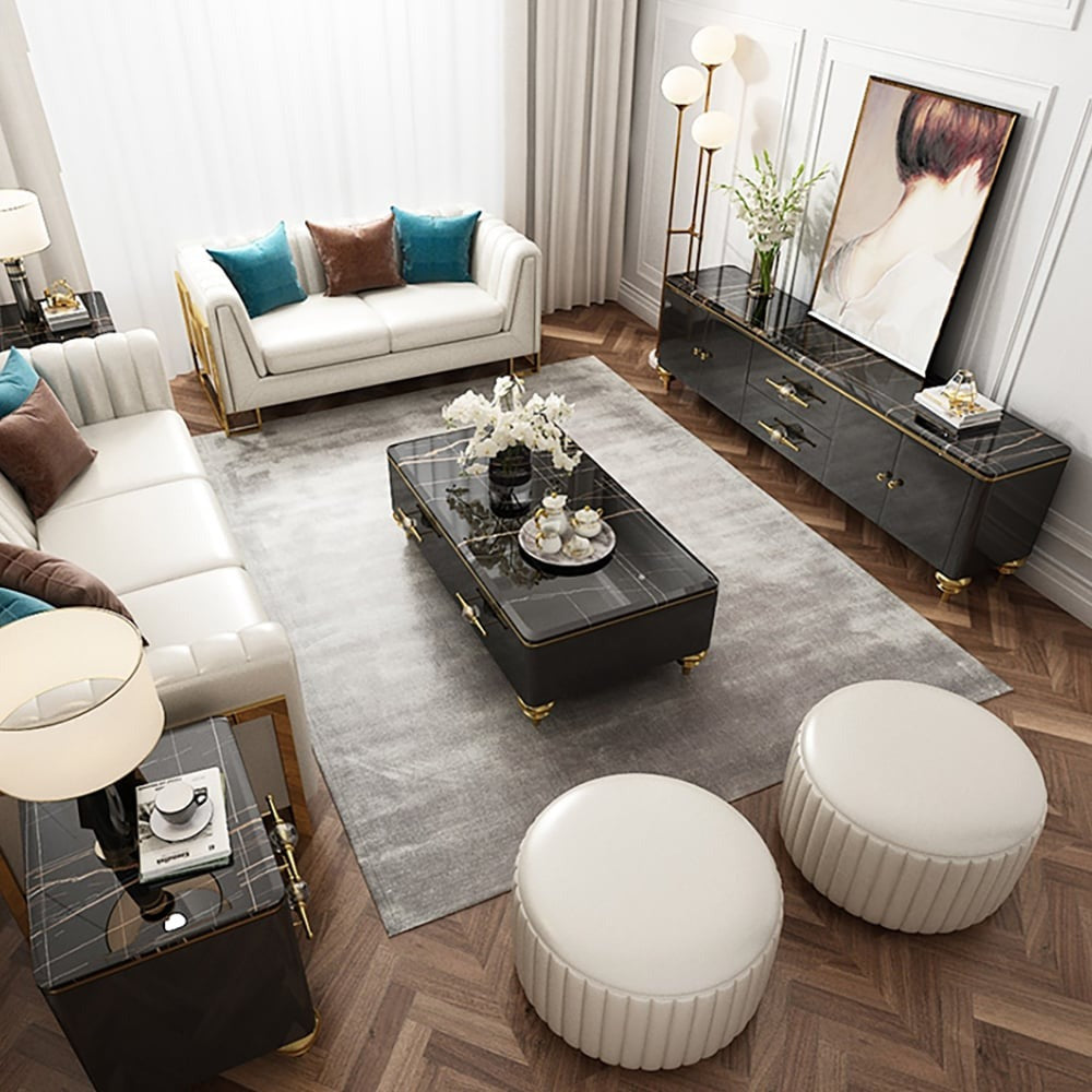 A sleek black tv unit in a living room with a marble-top rectangular center table and white sofa to make living space luxury.