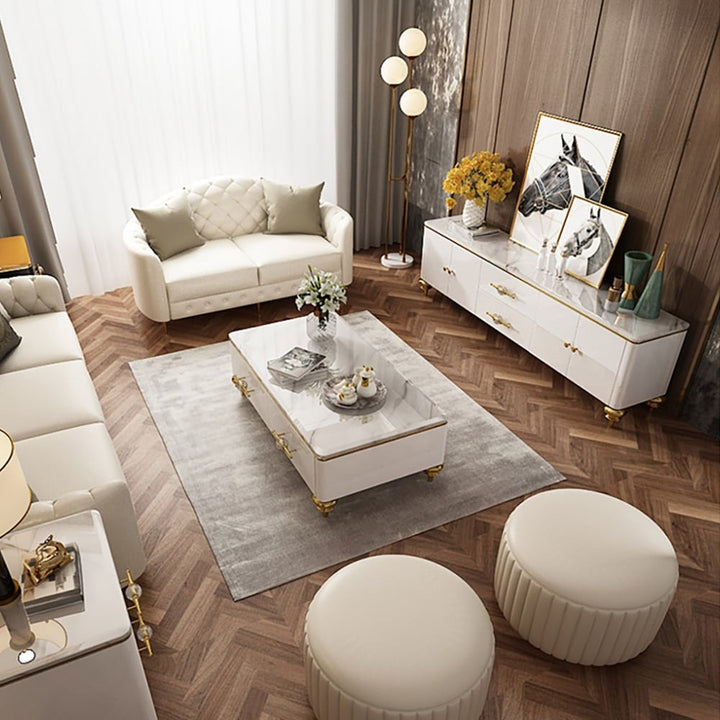 white tv unit design for living room
with white sofa, ottoman and marble-top center table