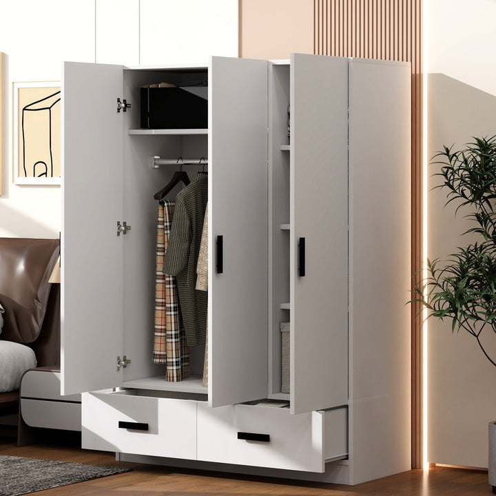 Premium white modular wardrobe with open doors displaying clothes in a room setting.