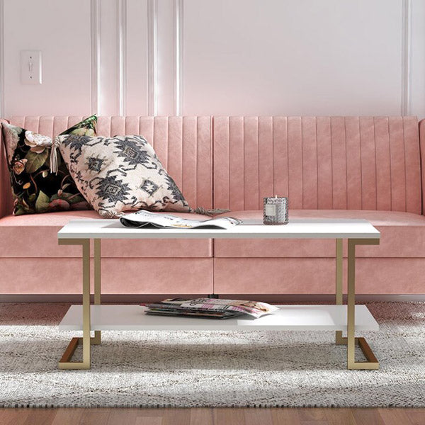 white gloss rectangular center table against a pink sofa 