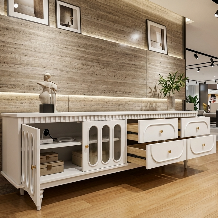 White mdf tv stand with decorative items in a modern living room setting.