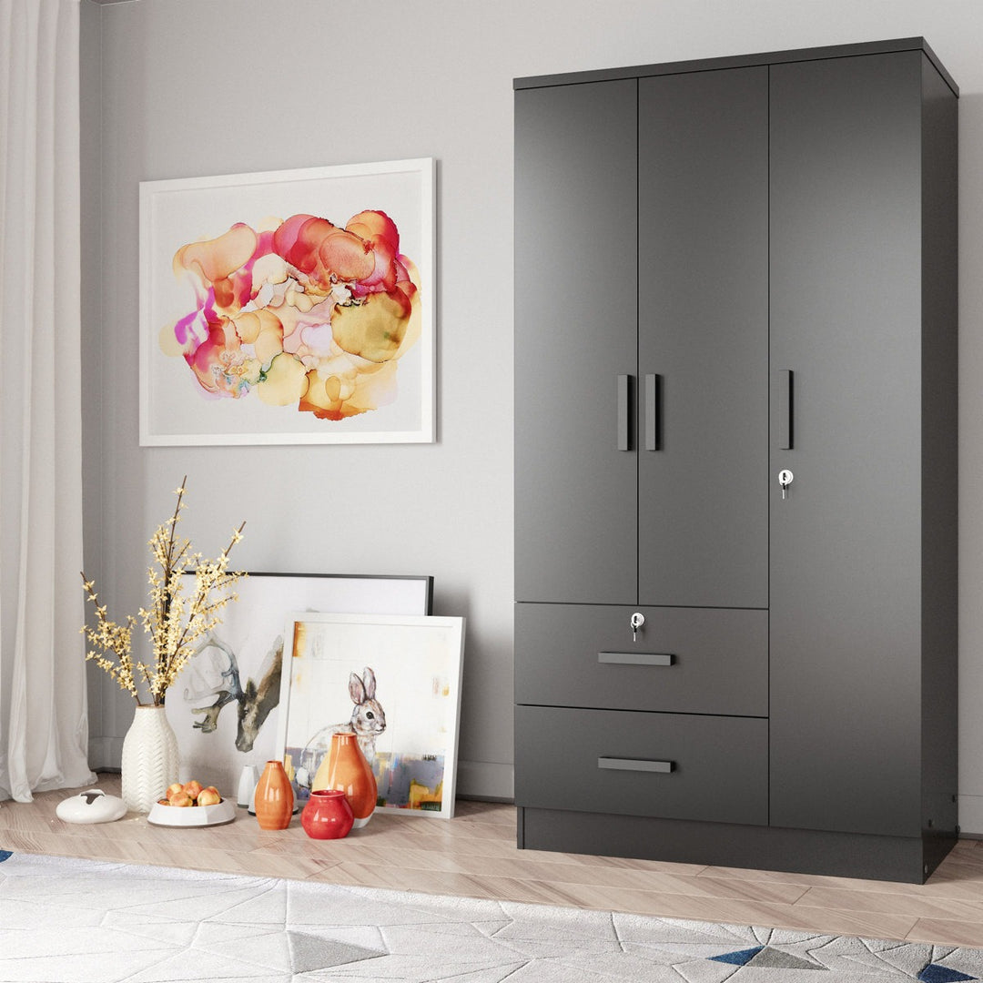 Modern black wardrobe in a room with decorative items on a shelf.