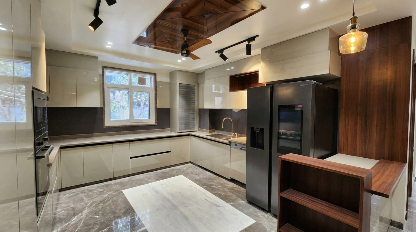 Modern kitchen with stainless steel appliances and wooden accents for luxury noida villas by heera moti