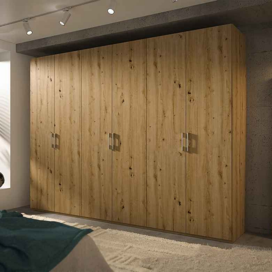 A large 6-door wardrobe with a Beech wood finish and matte silver handles, situated in a room with a dark wall and a white rug.