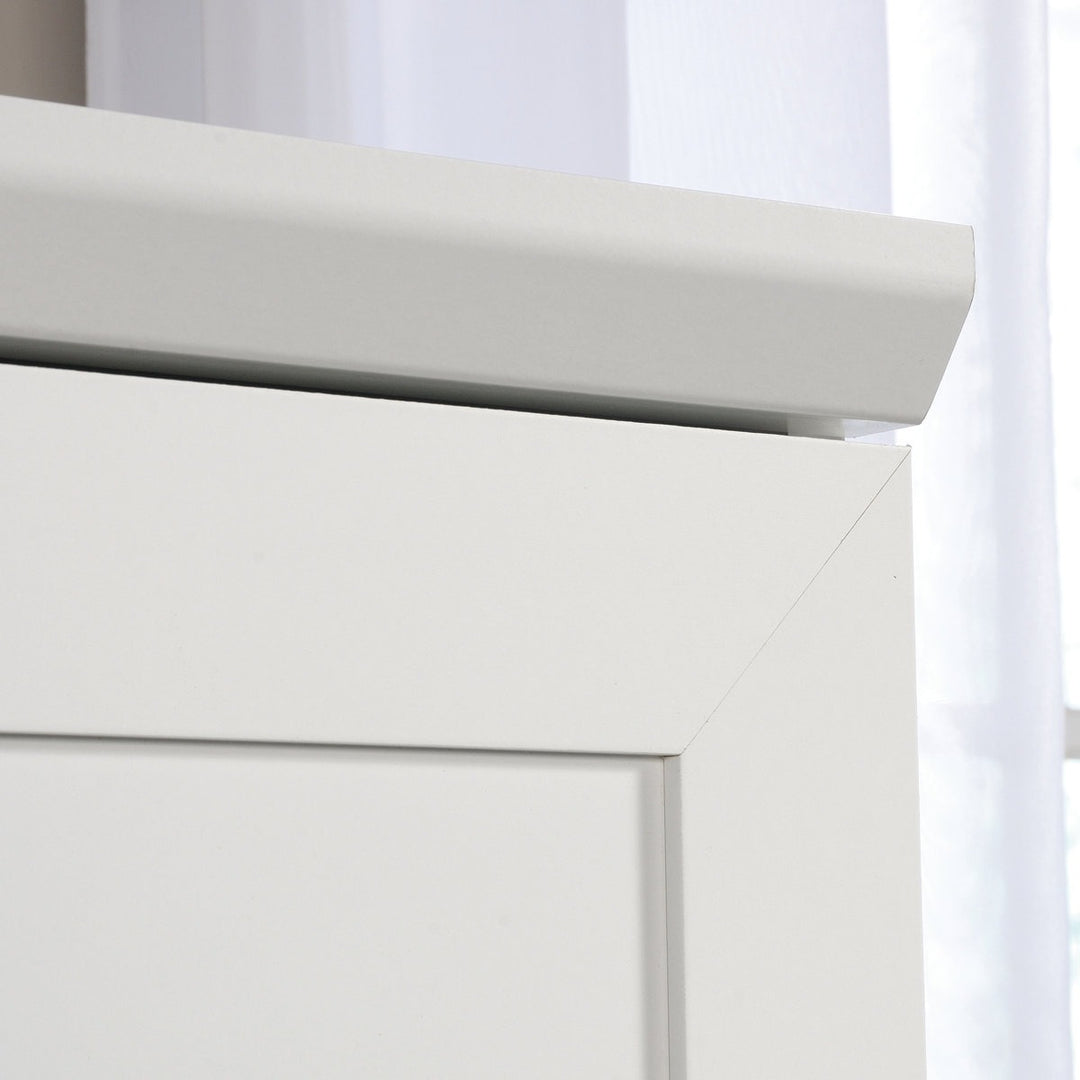 Close-up of a designer white wardrobe with a smooth finish